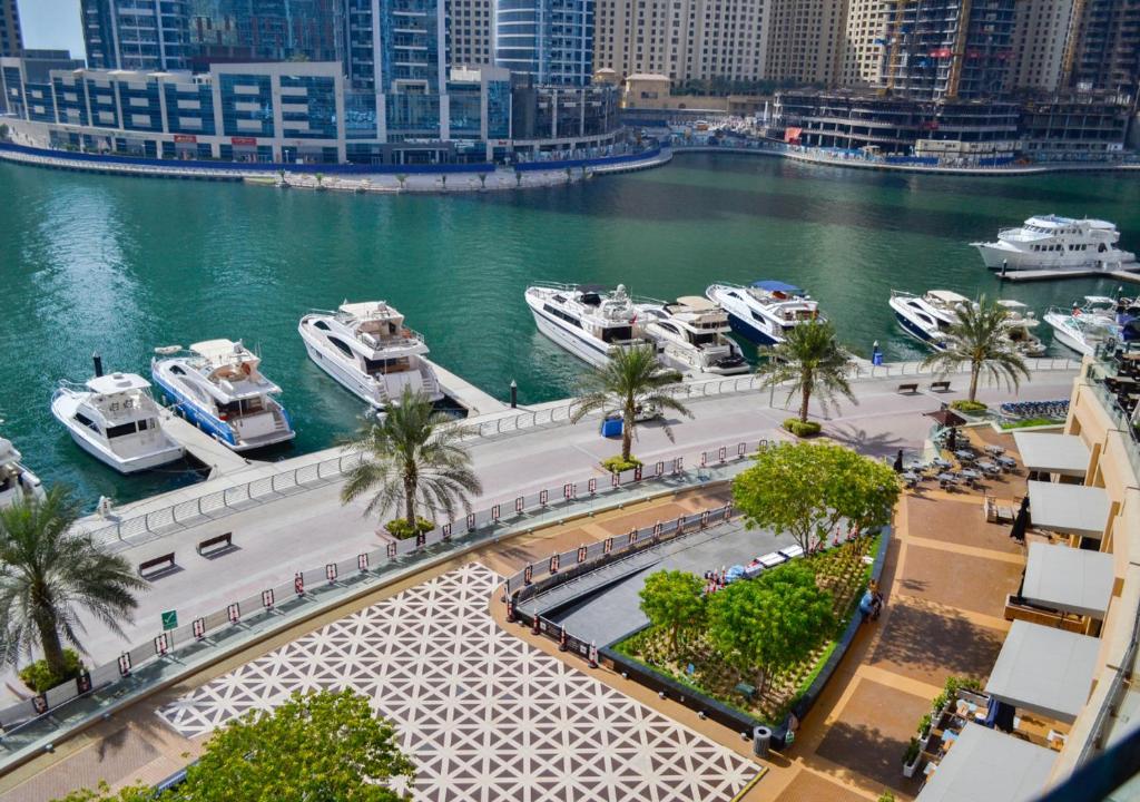 Dubai Marina luxury real estate partnership
